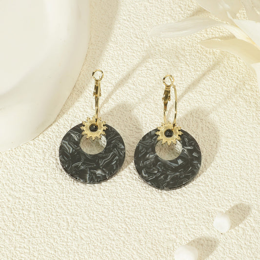 Boucles d'oreilles Dorées Soleil Pendantes Acrylique Noire Girl's Dream