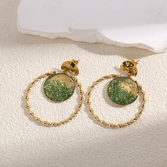 Boucles d'Oreilles Dorées Torsadées Avec Cristaux Vertes Girl's Dream