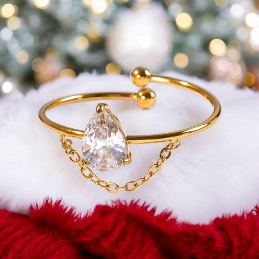 Bague dorée strass avec chaîne